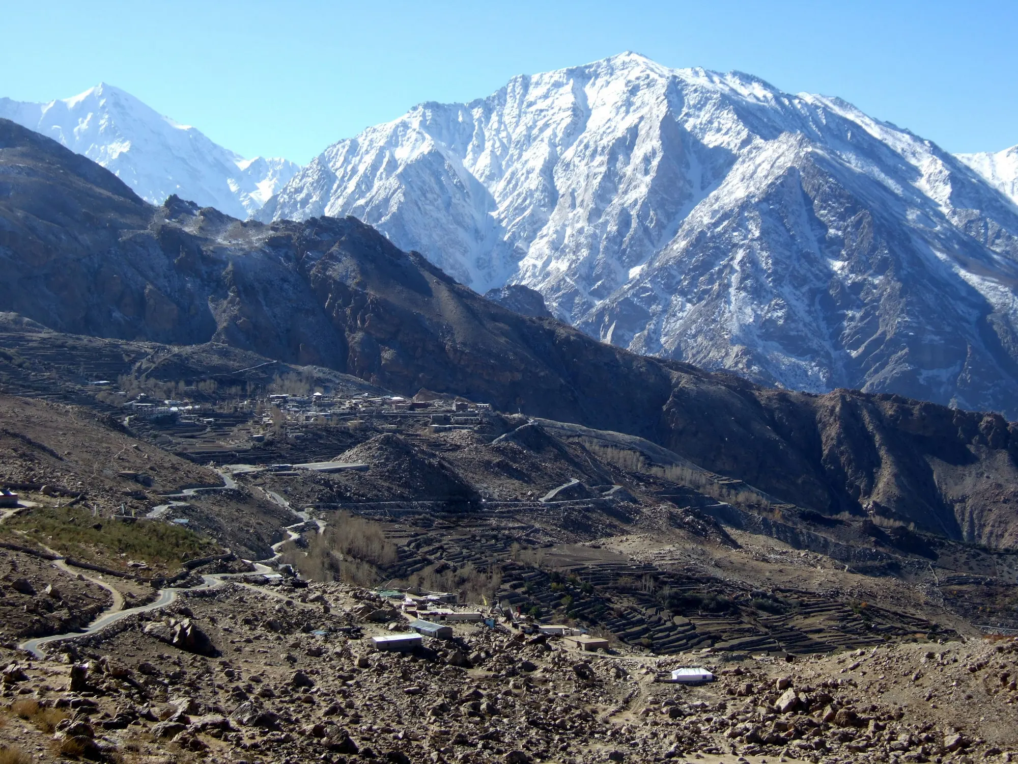 Snow capped peaks above the high, dry valley at Nako